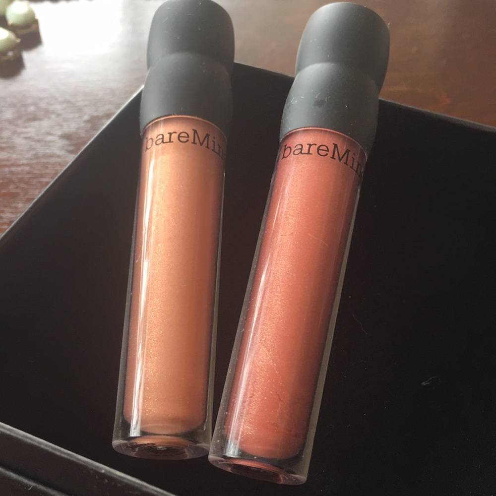 Set of two bare minerals lip gloss.